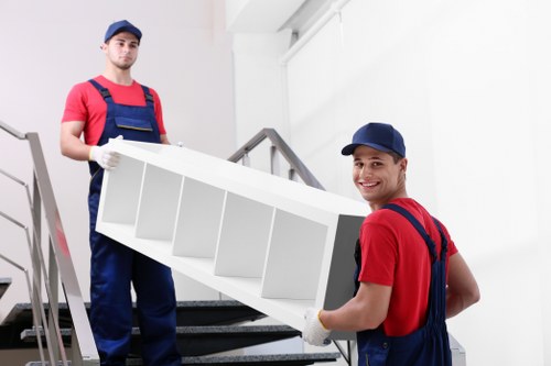 Man and van service loading boxes in Brixton
