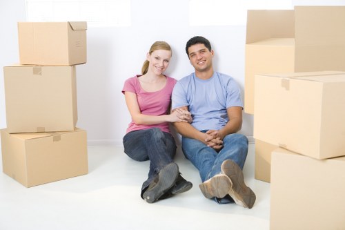 Unpacking household items in a Brixton flat after delivery