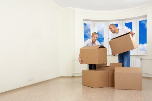 Organised workplace relocation with labelled boxes and furniture