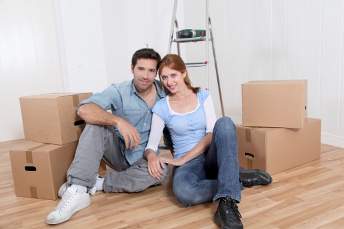 Mover using correct lifting technique with boxes