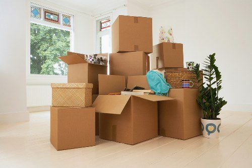Local packing materials and labelled moving boxes ready for collection