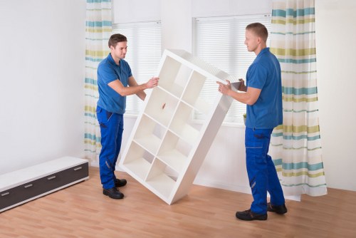 Careful loading of household furniture into a removal vehicle